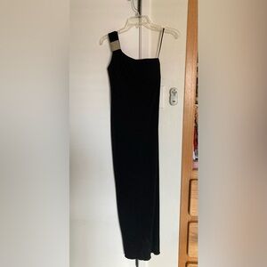 Tight fitting long black dress